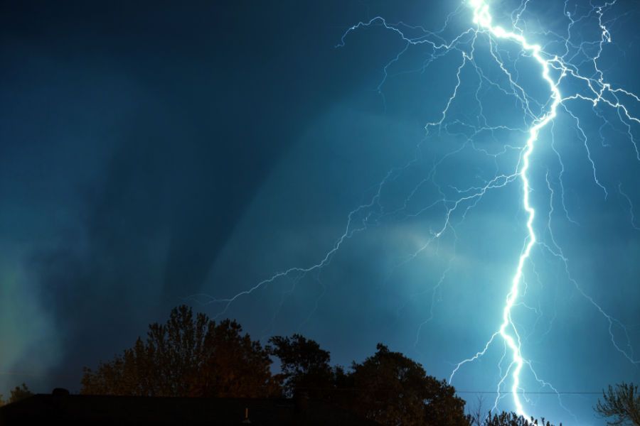 Whole House Generator - Story. Large lightening bolt in dark, stormy sky.